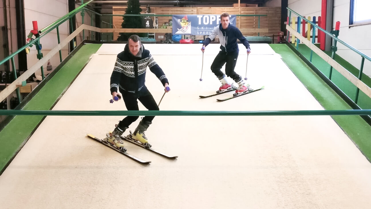 2 mannen op de skipiste