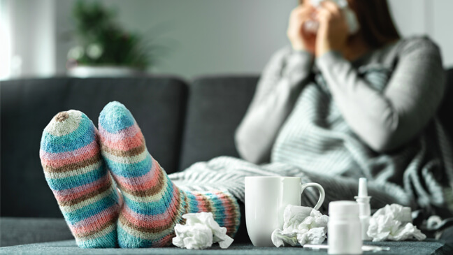 Zieke vrouw in zetel