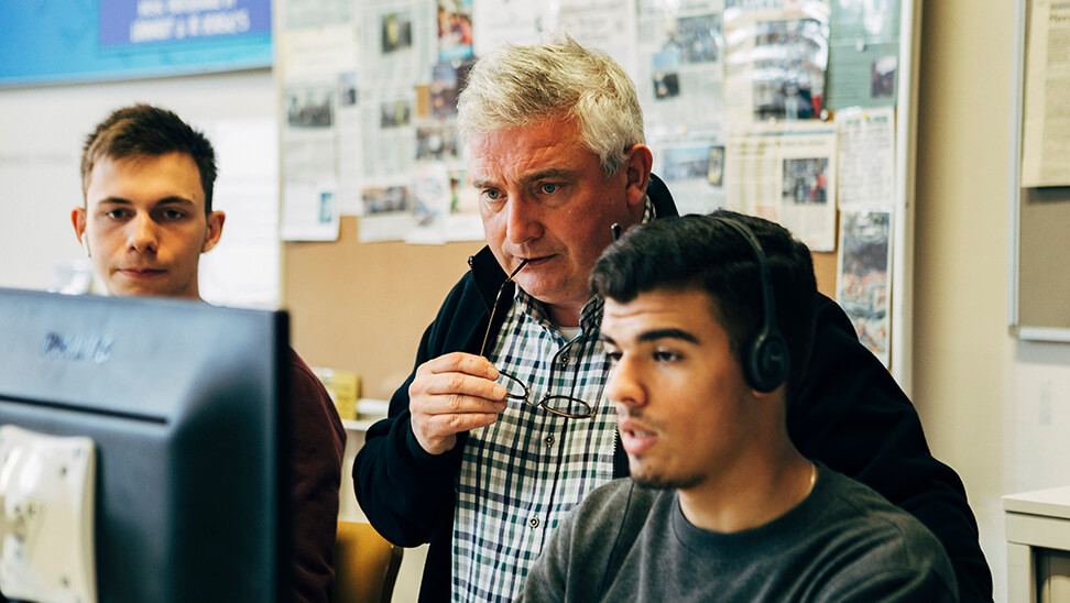 Diederik Roelandts met 2 leerlingen