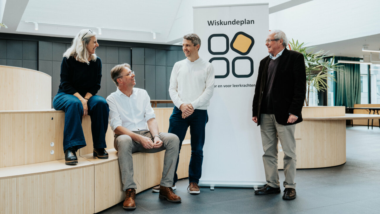 Groepsfoto van leraren die zelf hun leerplan wiskunde ontwikkelde