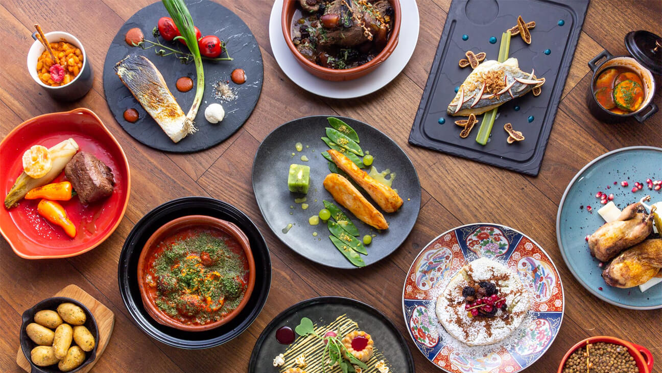 Tafel met gerechten uit Restaurant La Verveine